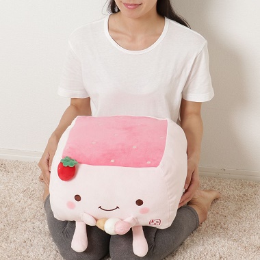 膝の上に置かれた はんなり豆腐ジェラートクッション Lサイズ